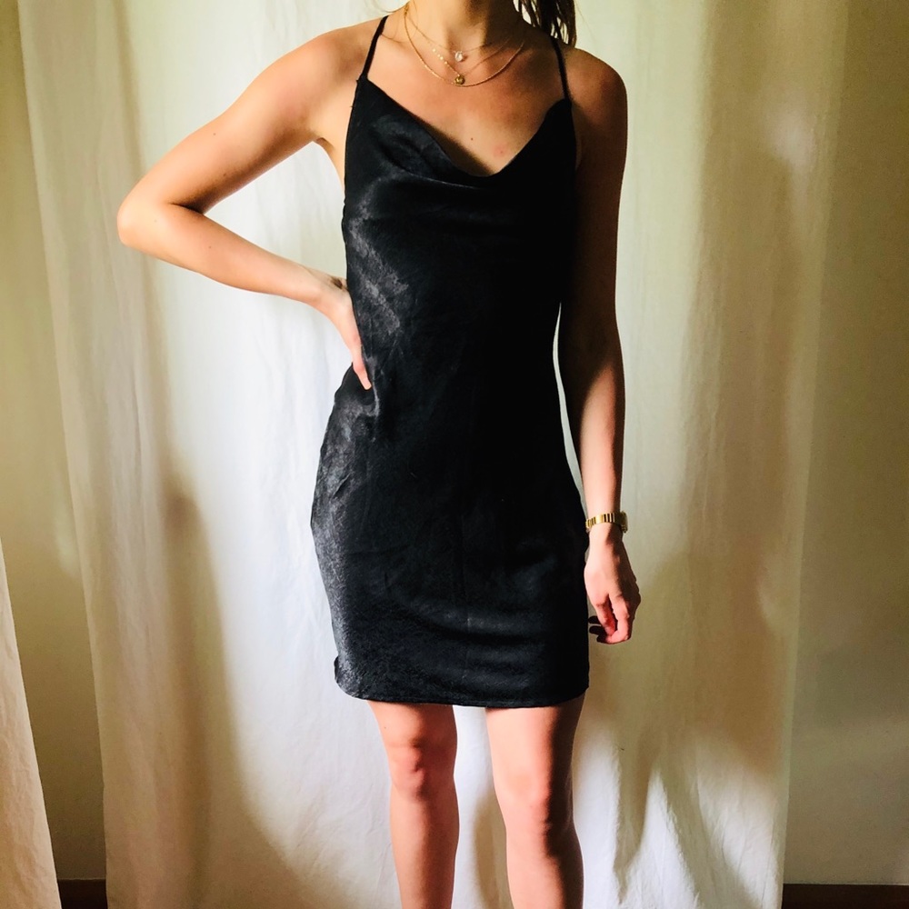 FRANCESCA’S cowl-neck slip dress.